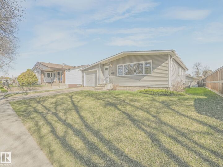 Property Photo:  5916 148 Avenue NW  AB T5A 1T9 