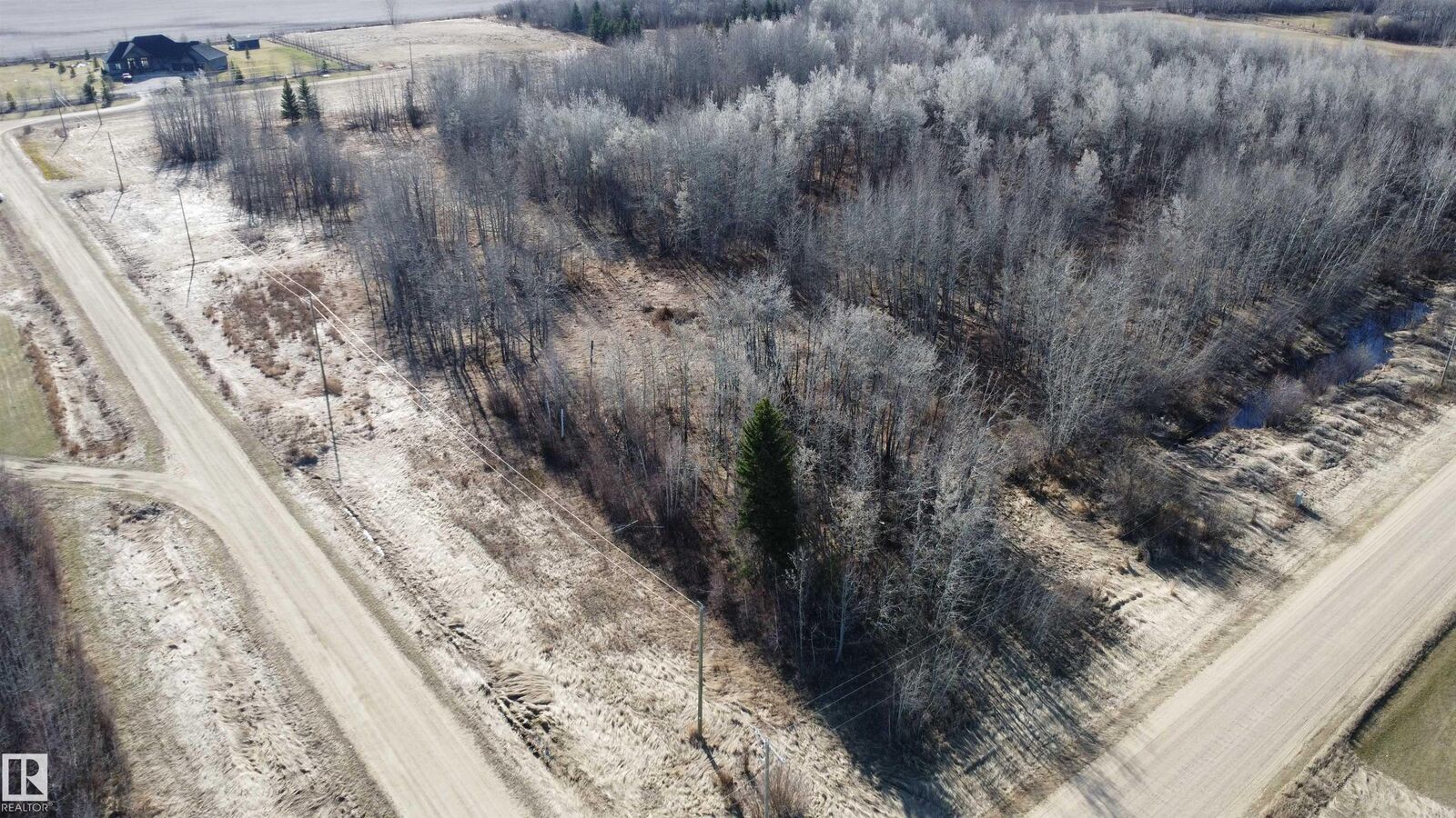 Property Photo:  #6 59229 Rg Rd 265  AB T7P 2P6 