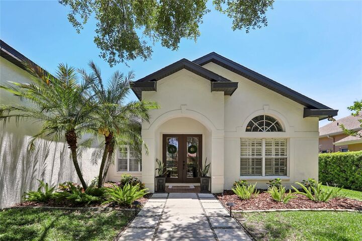 Property Photo:  6004 Merlinwood Drive  FL 33547 