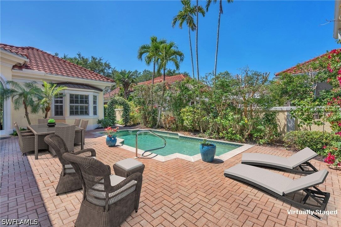 Property Photo:  7060 Verde Way  FL 34108 
