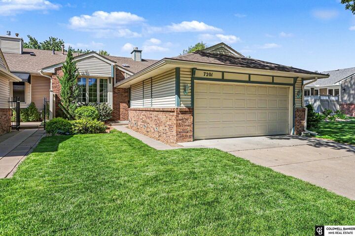 Property Photo:  7201 Grand Oaks Drive  NE 68516 