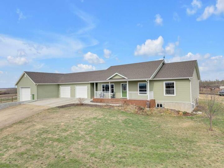 Property Photo:  1 -251061 Township Road 431A  AB T4J 1R1 