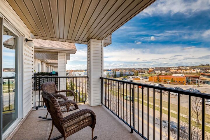 Property Photo:  12 Cimarron Common 1414  AB T1S 2G1 