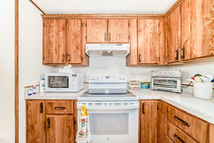 Property Photo: 99 Arbour Lake Road NW 138 AB T3G 4E4