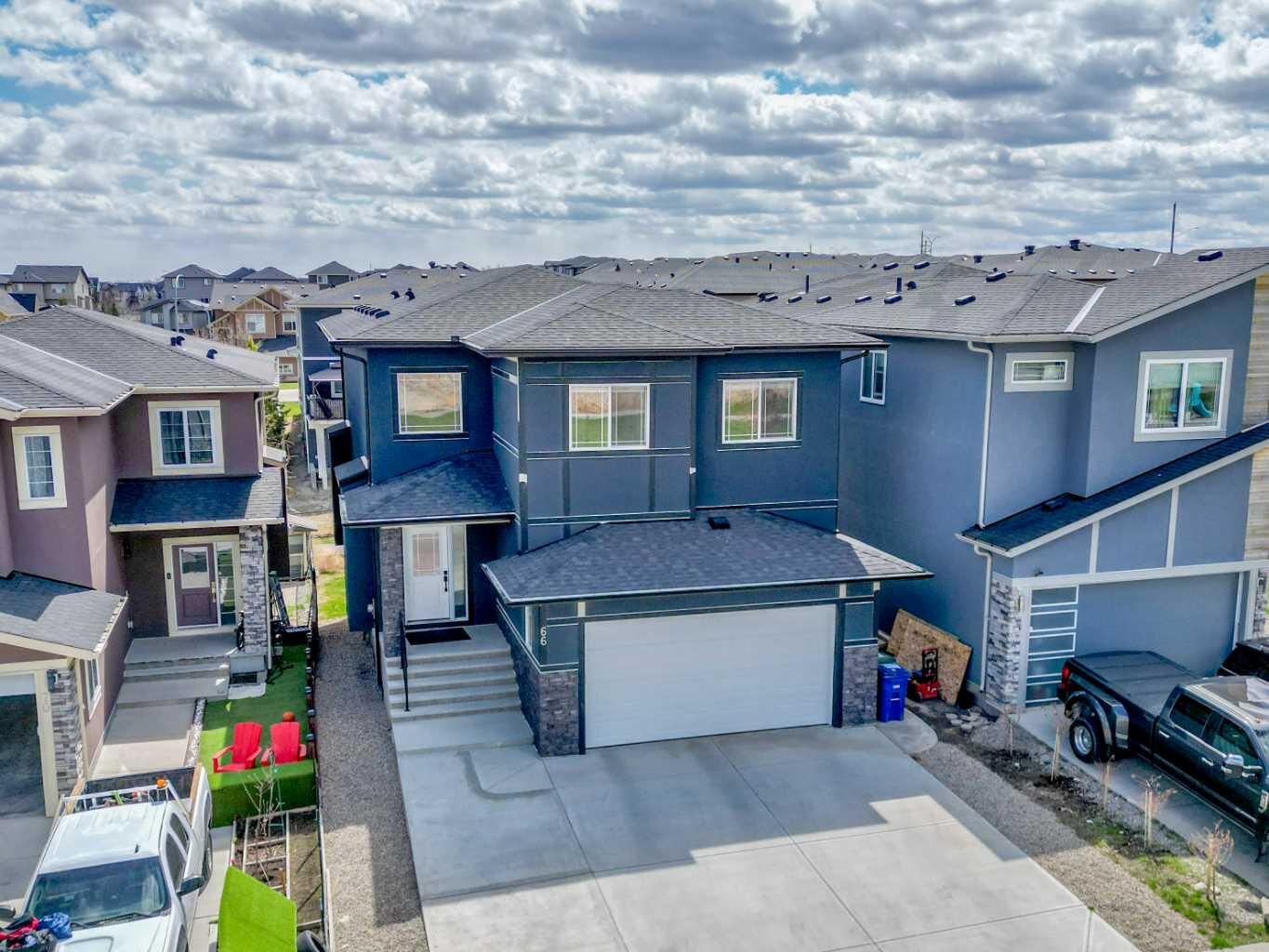 Property Photo:  66 Baysprings Gardens SW  AB T4B 5C6 