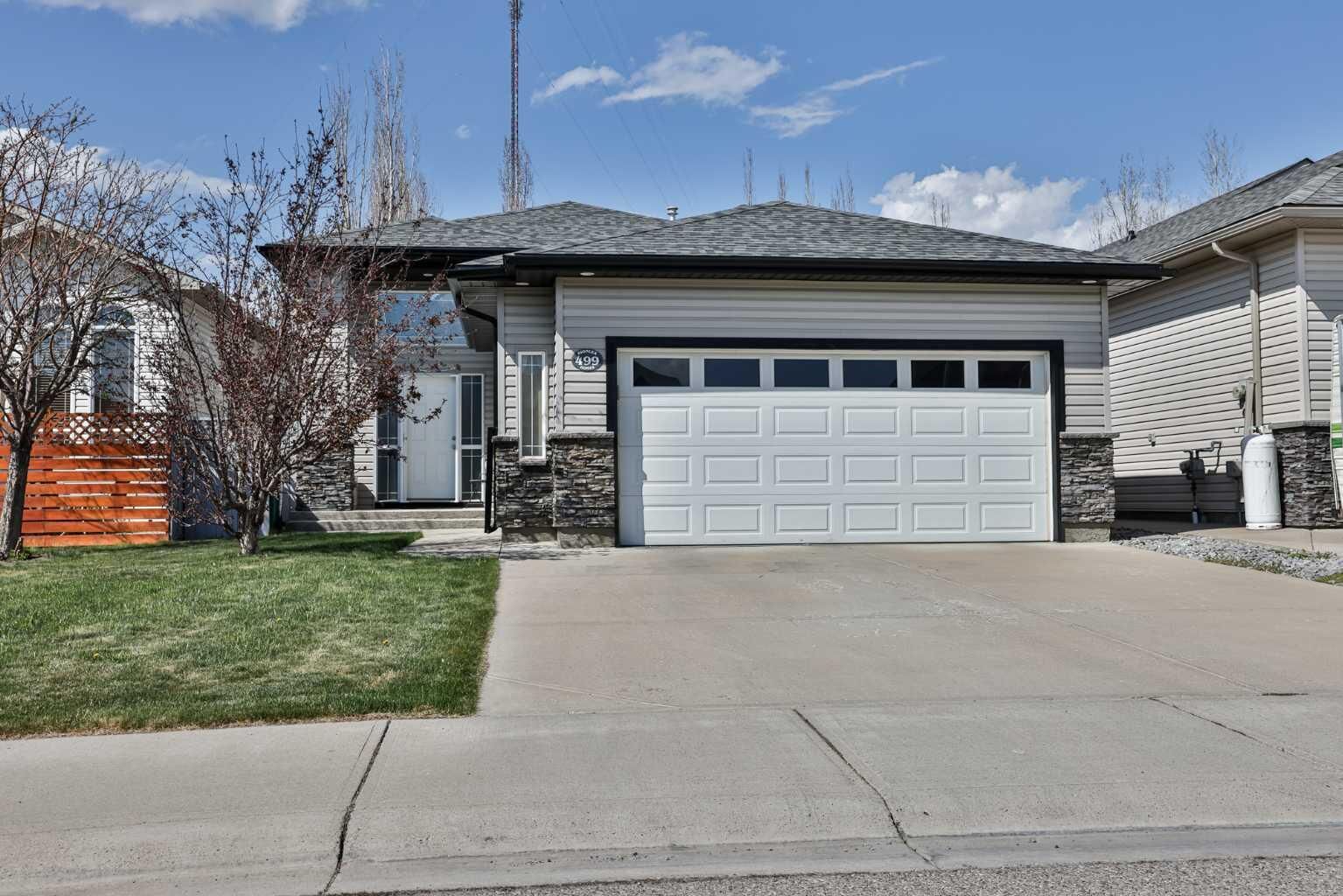 Property Photo:  499 Lynx Crescent N  AB T1H 6X5 