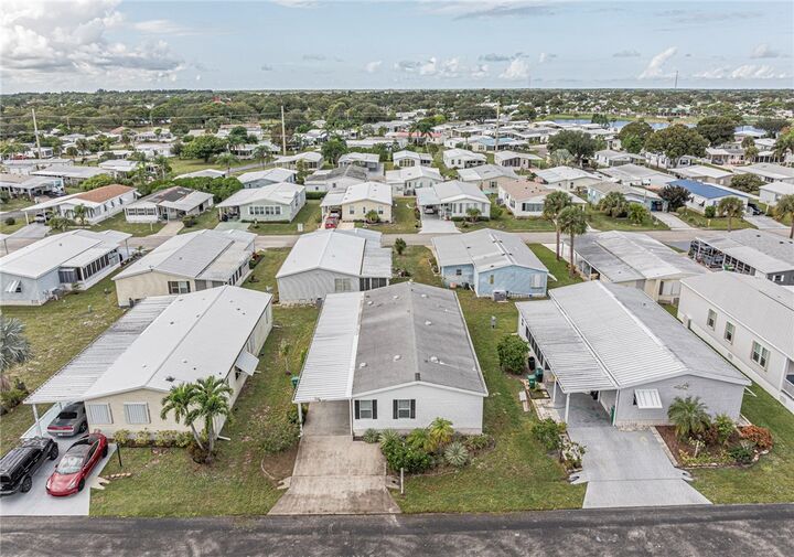 Property Photo:  7620 Boxelder Road 37  FL 32976 