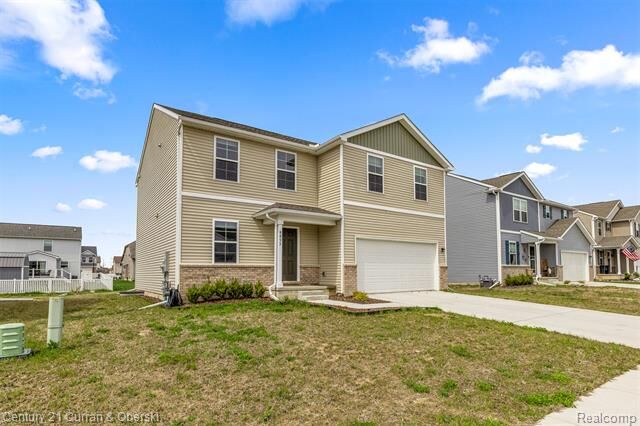 Property Photo:  9053 Sandstone Drive  MI 48166 