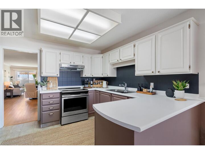 Property Photo:  1886 Parkview Crescent 3  BC V1X 7G6 