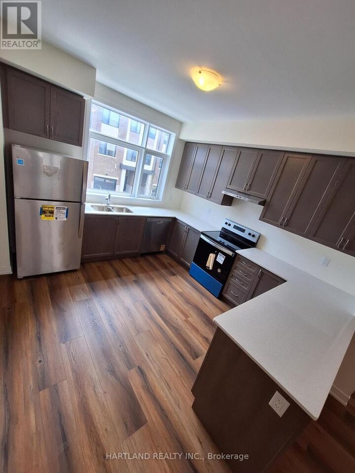 Property Photo:  1695 Dersan Street 1202  ON L1X 0S9 