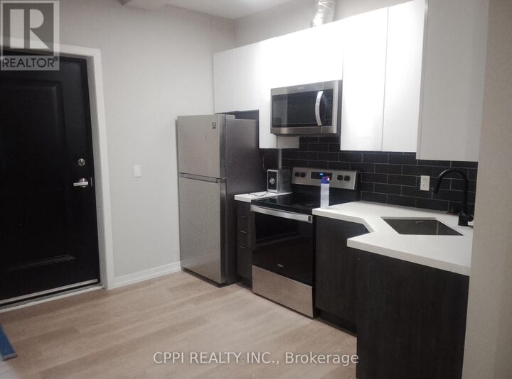 Property Photo:  140 Simcoe Street 223  ON K9H 0K5 