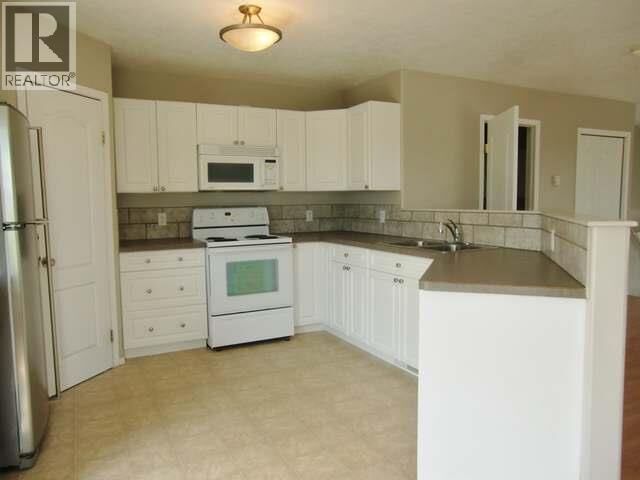 Property Photo:  509 99 Avenue  BC V1G 1T2 