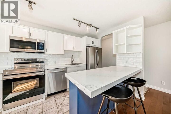 Property Photo:  835 18 Avenue Southwest  AB T2T 0G9 