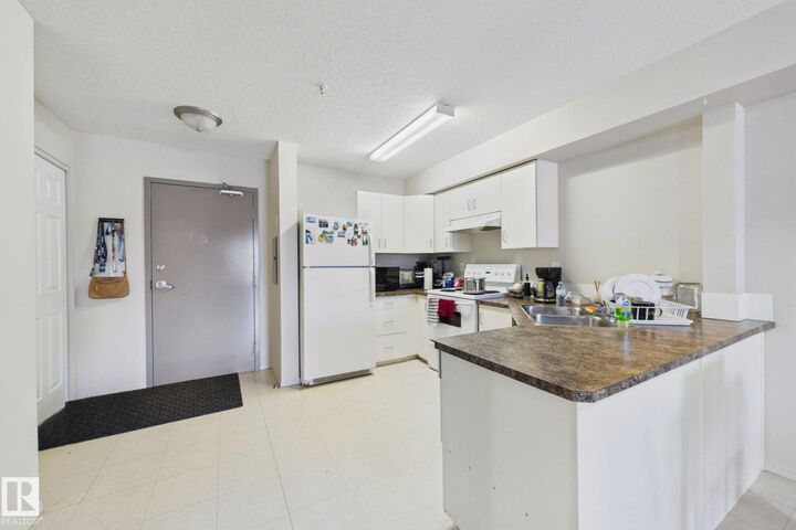 Property Photo:  80A Kelloway Crescent 220  AB T4P 4G7 