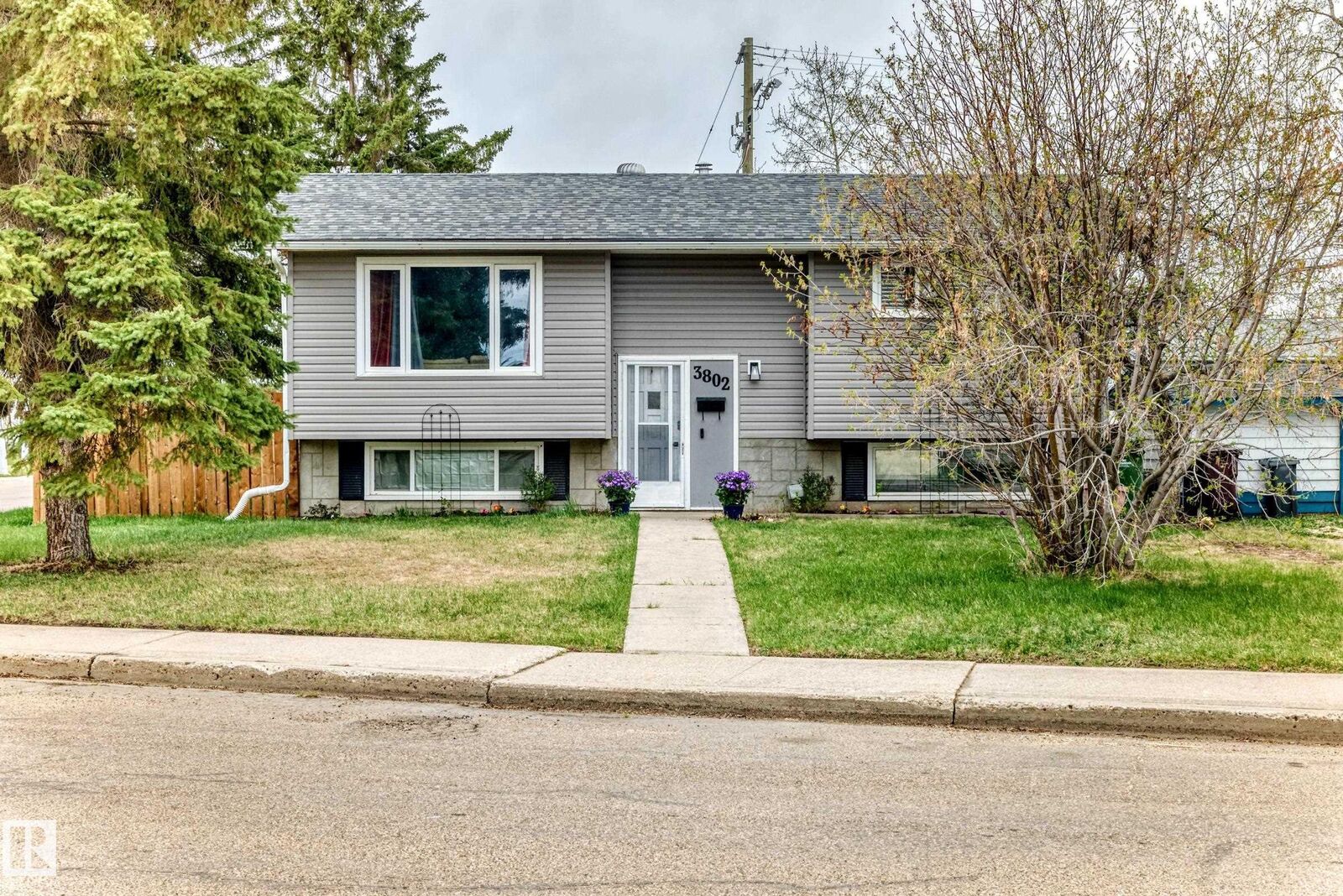 Property Photo:  3802 52 Street  AB T9A 1M4 