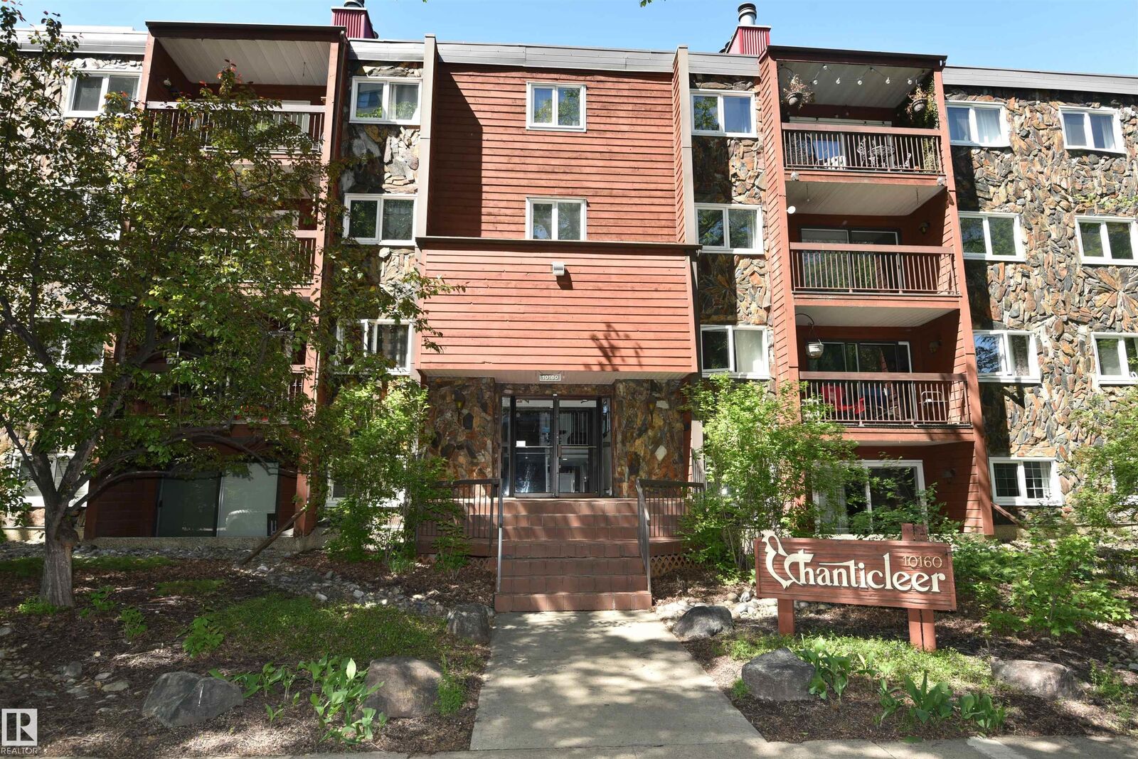 Property Photo: 10160 119 Street NW 21 AB T5K 1Y9