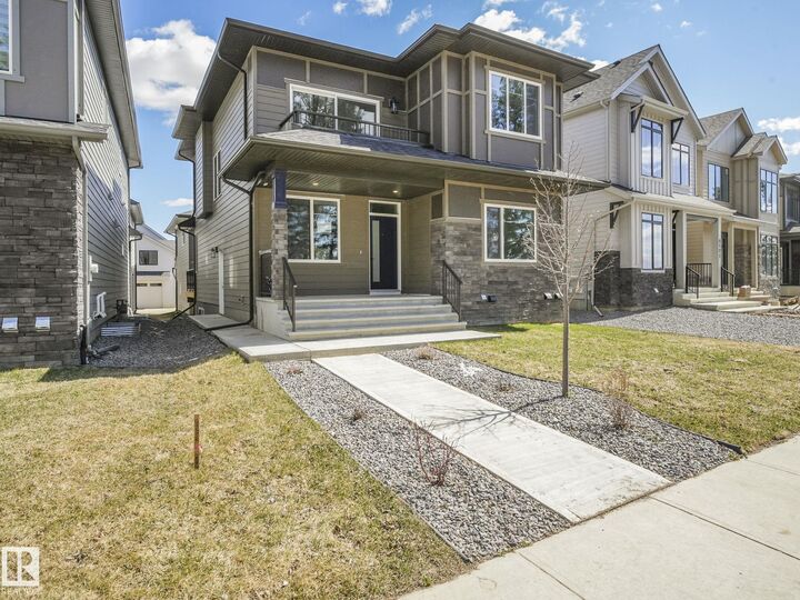 Property Photo:  6125 Crawford Drive SW  AB T6W 4L8 