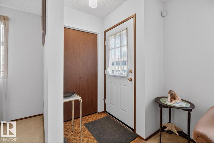 Property Photo:  8317 157 Avenue NW  AB T5Z 2P9 
