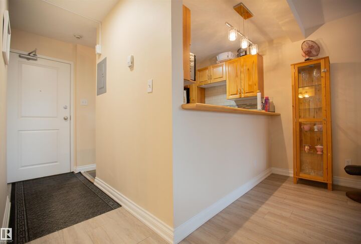 Property Photo:  11033 127 Street NW 213  AB T5M 0T3 