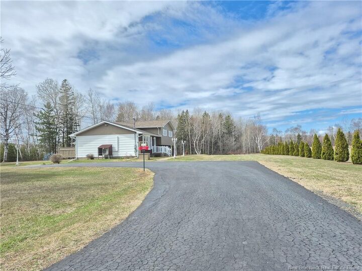 Property Photo:  48 Rue Pierre  NB E8J 3C2 