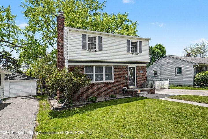 Property Photo:  1927 Cooper Avenue  MI 48910 