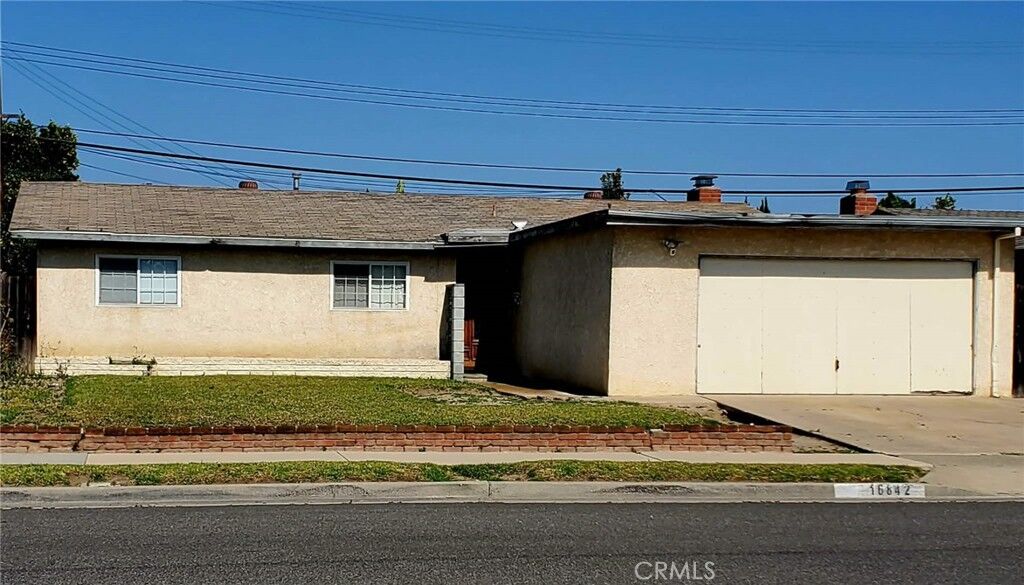 Property Photo:  16842 Ross  CA 92647 