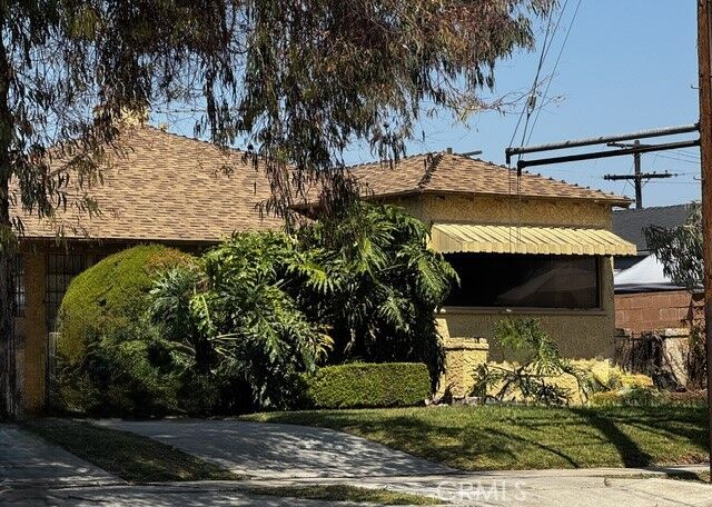 Property Photo: 10815 S Hoover CA 90044