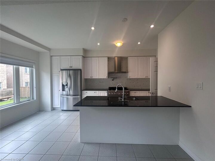 Property Photo:  3948 Thomas Alton Boulevard  ON L7M 2A4 