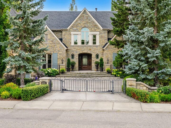 Property Photo: 12231 Lake Louise Way SE AB T2J 2M2