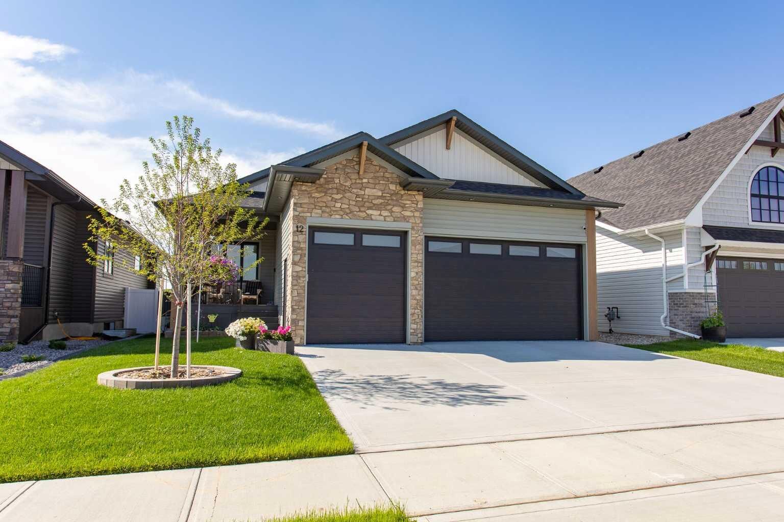 Property Photo:  12 Emmett Crescent  AB T4P 3G8 