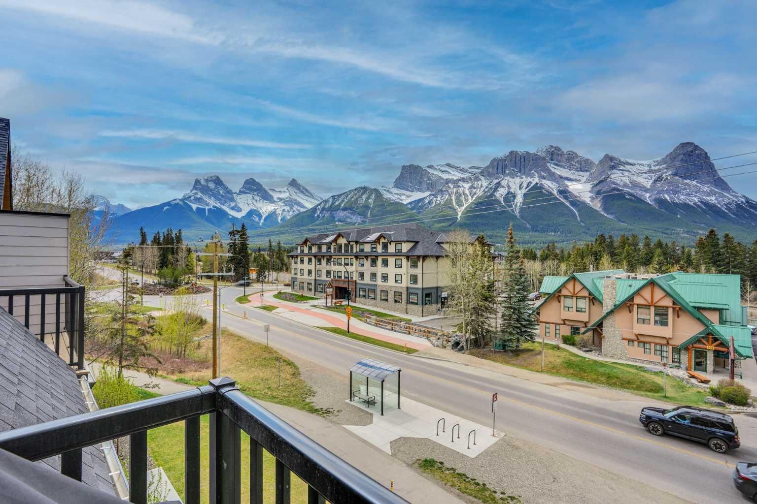 Property Photo:  109 Kanananskis Way 206  AB T1W 2X2 