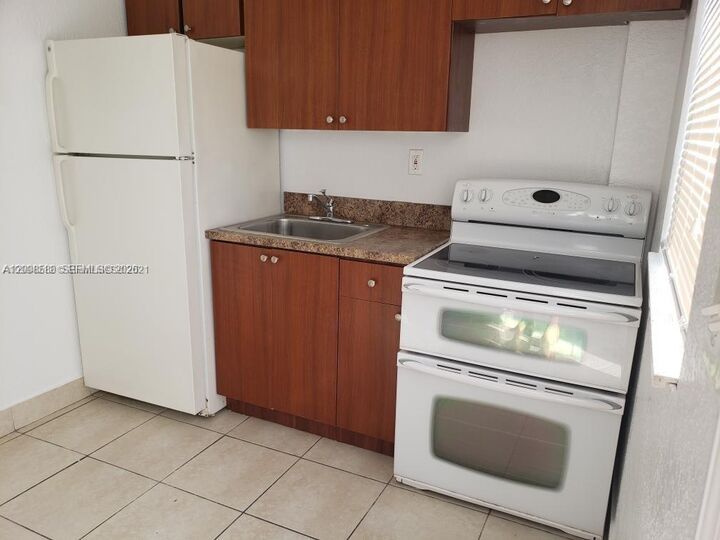Property Photo:  2929 NW 88th St 4  FL 33147 