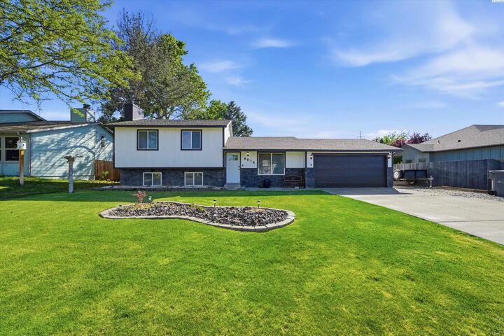 Property Photo:  8915 W Deschutes Ave  WA 99336 