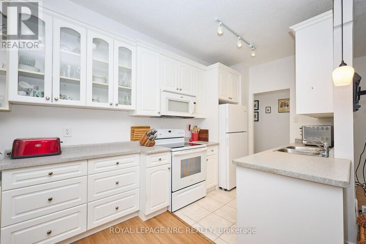 Property Photo:  6390 Huggins Street 101  ON L2J 1H1 