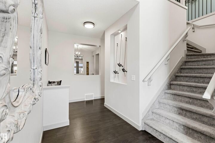 Property Photo: 7343 Armour Crescent SW AB T6W 2S2