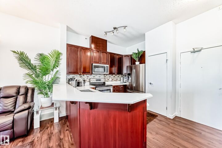 Property Photo:  4312 139 Avenue NW 412  AB T5Y 3J4 