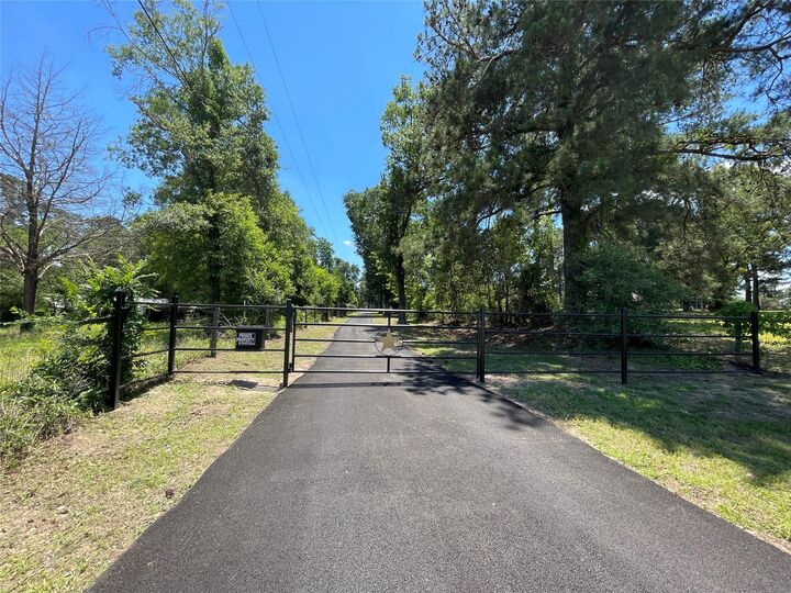 Property Photo:  19439 Keenan Cut Off Road  TX 77316 