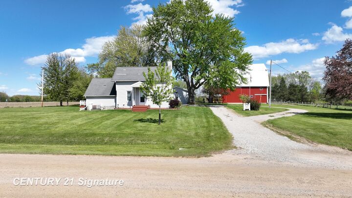 Property Photo:  7897 S Grove Road  MI 48820 