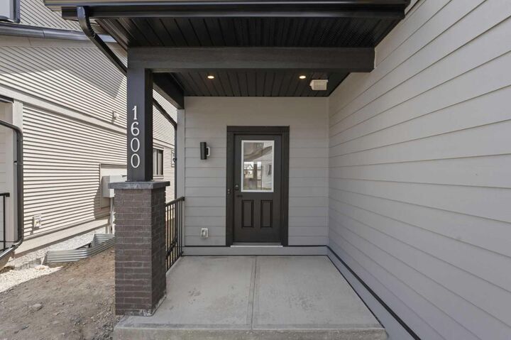 Property Photo:  15 Coopersfield Link SW 1600  AB T4B 5P5 