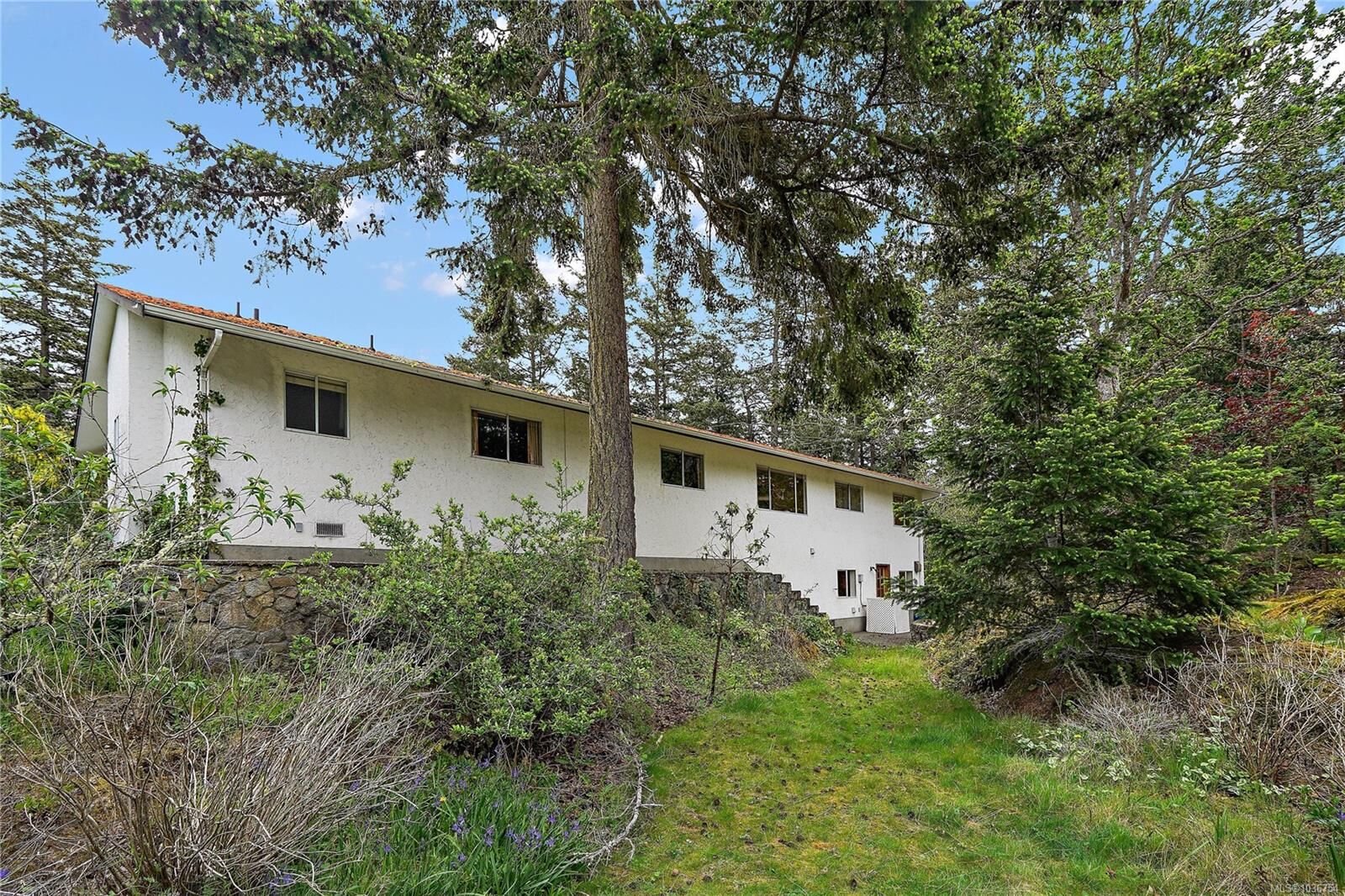 Property Photo:  3976 Tudor Ave  BC V8N 4L6 