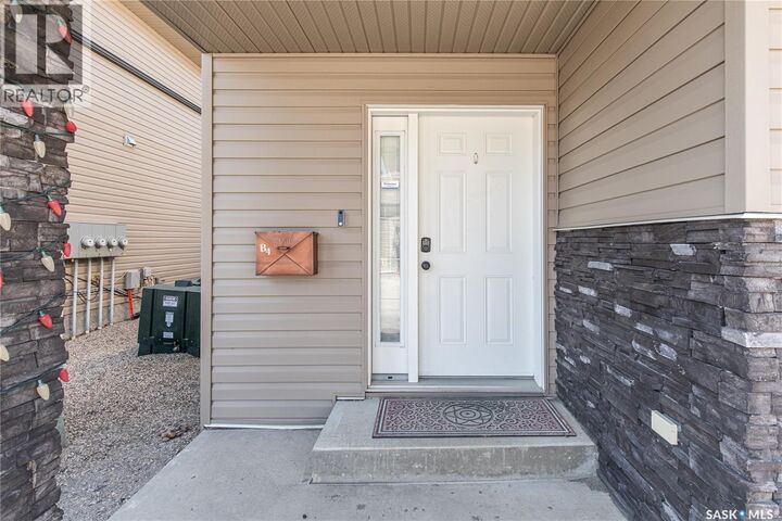 Property Photo:  B4 33 Wood Lily Drive  SK S6J 1E6 