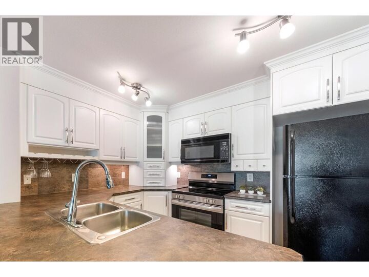 Property Photo: 135 Ziprick Road 206 BC V1X 8B2