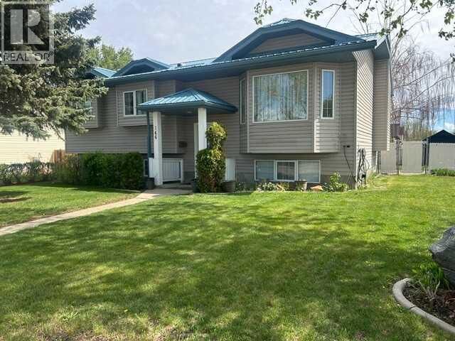 Property Photo:  144 Upland Boulevard West  AB T1R 0R3 