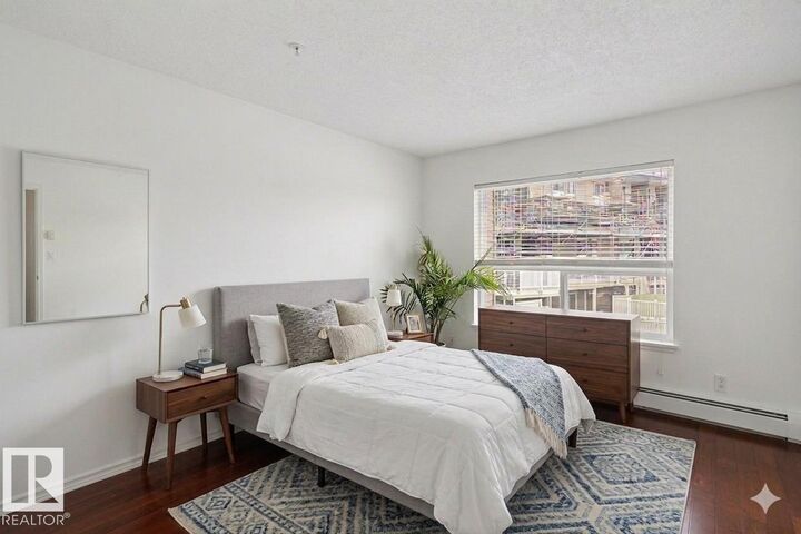 Property Photo:  17404 64 Avenue NW 213  AB T5T 6X4 