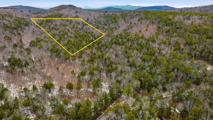 Property Photo: 101-15 North Shore Road NH 03855