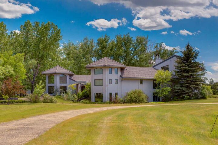 Property Photo: 280203 Township Road 235A AB T1X 2C6