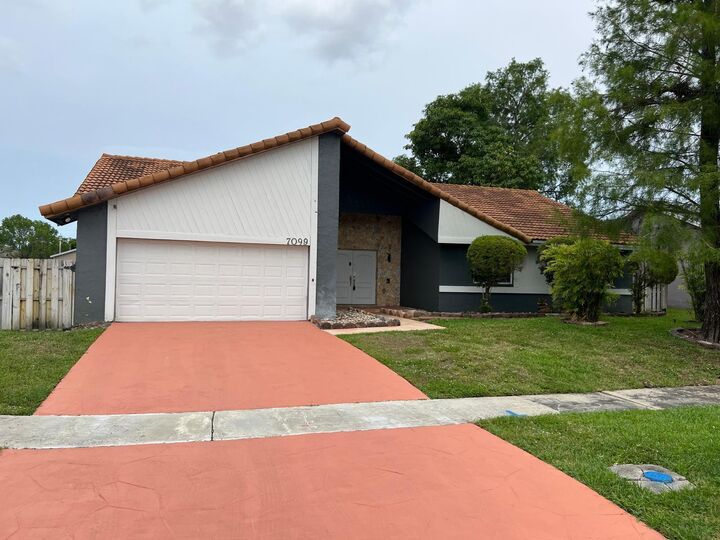 Property Photo: 7099 NW 48th Court FL 33319