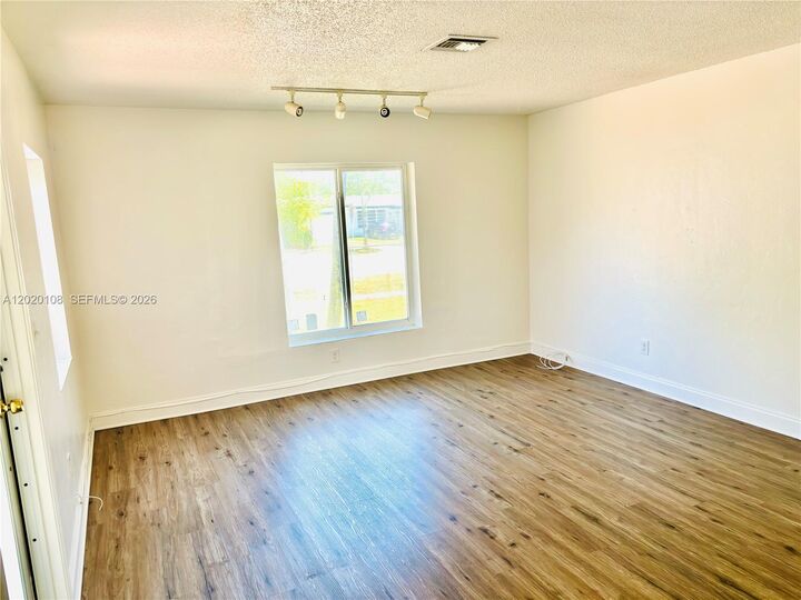 Property Photo:  9820 Caribbean Blvd  FL 33189 