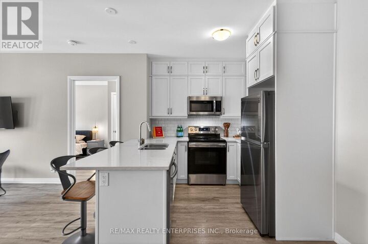 Property Photo:  102 Grovewood Common 510  ON L9H 0X2 