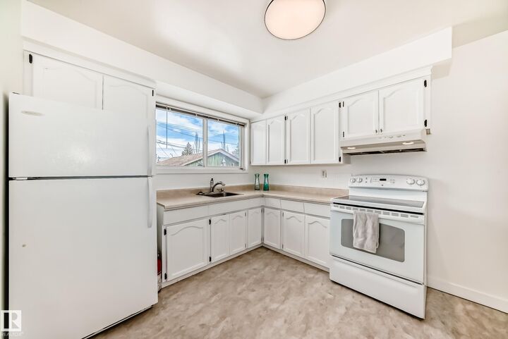 Property Photo:  12824 134 Avenue NW  AB T5L 3V5 